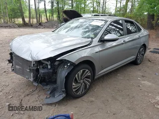 2020 Volkswagen Jetta SEL z VIN 3VWE57BU9LM082552, wystawiony jako IAAI lot #42091492 z przebiegiem 60 775 mil mil oraz . Historia ofert i sprzedaży dostępna na DreamBid. Obrazek 17.