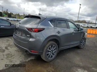2018 Mazda CX-5 Touring with VIN JM3KFBCM1J0372702, listed as a Copart auction lot 49714595 with 107,805 mi miles and Salvage Title. Bid and sale history available at carsss.com. Image 3.