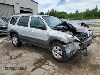 2003 Mazda Tribute ES with VIN 4F2CZ06193KM25468, listed as a Copart auction lot 59879914 with 214,393 mi miles and Salvage Title. Bid and sale history available at carsss.com. Image 4.