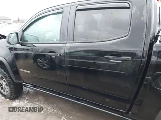 2018 Chevrolet Colorado 4WD ZR2 with VIN 1GCGTEEN9J1173647, listed as a IAAI auction lot 42016015 with 102,041 mi miles. Bid and sale history available at carsss.com. Image 15.