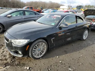 2014 BMW 4 Series 428i xDrive with VIN WBA3T1C55EPS98252, listed as a Copart auction lot 83150394 with 107,036 mi miles and Clean Title. Bid and sale history available at carsss.com. Image 1.