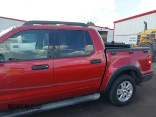 2007 Ford Explorer Sport Trac XLT with VIN 1FMEU31K47UA56890, listed as a IAAI auction lot 42566342 with 210,900 mi miles and . Bid and sale history available at DreamBid. Image 3.