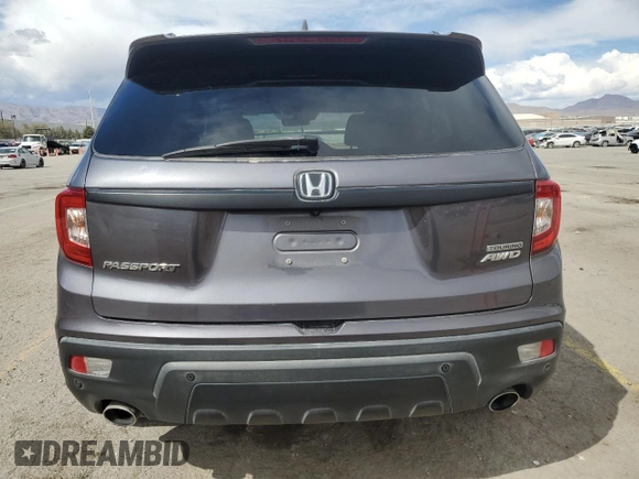 2020 Honda Passport Touring z VIN 5FNYF8H9XLB007336, wystawiony jako Copart lot #51012975 z przebiegiem 74 620 mil mil oraz Szkoda całkowita • Salvage title. Historia ofert i sprzedaży dostępna na DreamBid. Obrazek 6.