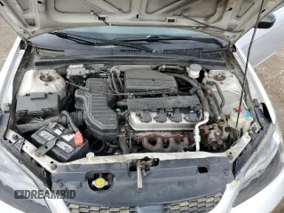 2004 Honda Civic LX z VIN 1HGEM22544L074056, wystawiony jako Copart lot #58353295 z przebiegiem 134 566 mil mil oraz Czysty tytuł • Clean title. Historia ofert i sprzedaży dostępna na DreamBid. Obrazek 11.