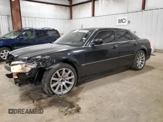 2006 Chrysler 300 C SRT8 with VIN 2C3LA73WX6H106631, listed as a Copart auction lot 50715715 with 104,990 mi miles and Clean Title. Bid and sale history available at carsss.com. Image 1.