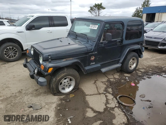 2002 Jeep Wrangler Sahara z VIN 1J4FA59S42P776905, wystawiony jako Copart lot #53373015 z przebiegiem 231 915 mil mil oraz Czysty tytuł • Clean title. Historia ofert i sprzedaży dostępna na DreamBid. Obrazek 1.