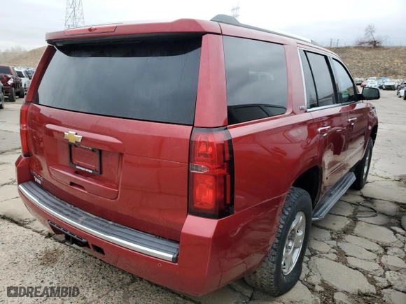 2015 Chevrolet Tahoe LTZ with VIN 1GNSKCKC8FR133323, listed as a Copart auction lot 47989525 with 123,391 mi miles and Salvage Title. Bid and sale history available at carsss.com. Image 3.