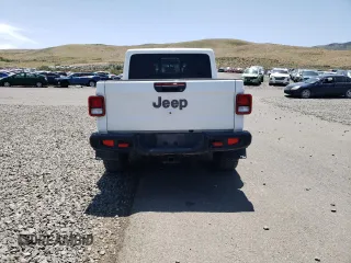 2022 Jeep Gladiator Rubicon z VIN 1C6JJTBG4NL135430, wystawiony jako Copart lot #52581015 z przebiegiem 54 553 mil mil oraz Szkoda całkowita • Salvage title. Historia ofert i sprzedaży dostępna na DreamBid. Obrazek 6.