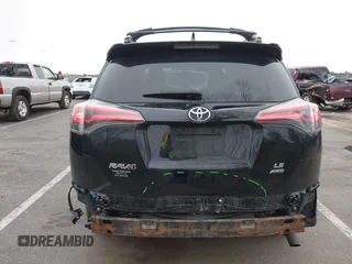 2016 Toyota RAV4 LE with VIN 2T3BFREV3GW447802, listed as a IAAI auction lot 41985438 with 213,247 mi miles. Bid and sale history available at carsss.com. Image 16.