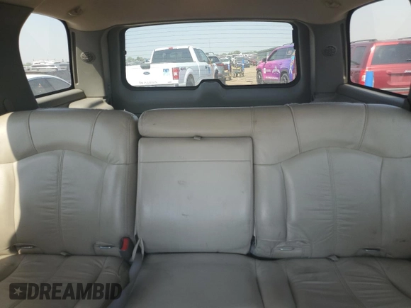 2002 Chevrolet Tahoe LT with VIN 1GNEK13Z12R129080, listed as a Copart auction lot 65446334 with 339,777 mi miles and Salvage Title. Bid and sale history available at carsss.com. Image 10.