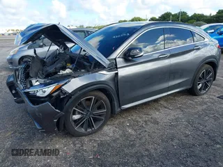 2023 Infiniti QX55 Luxe z VIN 3PCAJ5JR3PF106482, wystawiony jako IAAI lot #40831385 z przebiegiem 33 013 mil mil oraz . Historia ofert i sprzedaży dostępna na DreamBid. Obrazek 2.