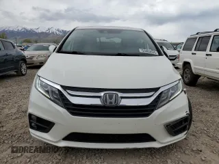 2018 Honda Odyssey EX-L with VIN 5FNRL6H71JB059936, listed as a Copart auction lot 53403635 with 94,745 mi miles and Salvage Title. Bid and sale history available at DreamBid. Image 5.