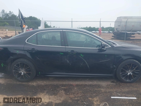 2023 Toyota Camry SE with VIN 4T1G11AKXPU827360, listed as a IAAI auction lot 42217356 with 57,497 mi miles and . Bid and sale history available at DreamBid. Image 13.