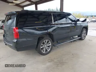 2016 Chevrolet Suburban LTZ with VIN 1GNSKJKC9GR179622, listed as a IAAI auction lot 41987586 with 245,534 mi miles. Bid and sale history available at carsss.com. Image 4.