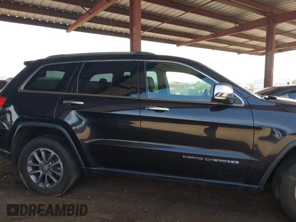 2014 Jeep Grand Cherokee Limited z VIN 1C4RJFBM9EC409093, wystawiony jako IAAI lot #42255242 z przebiegiem 121 059 mil mil oraz . Historia ofert i sprzedaży dostępna na DreamBid. Obrazek 13.