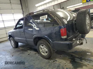 2000 Chevrolet Blazer LS z VIN 1GNCT18WXYK132399, wystawiony jako Copart lot #87880555 z przebiegiem 89 350 mil mil oraz Czysty tytuł • Clean title. Historia ofert i sprzedaży dostępna na DreamBid. Obrazek 2.