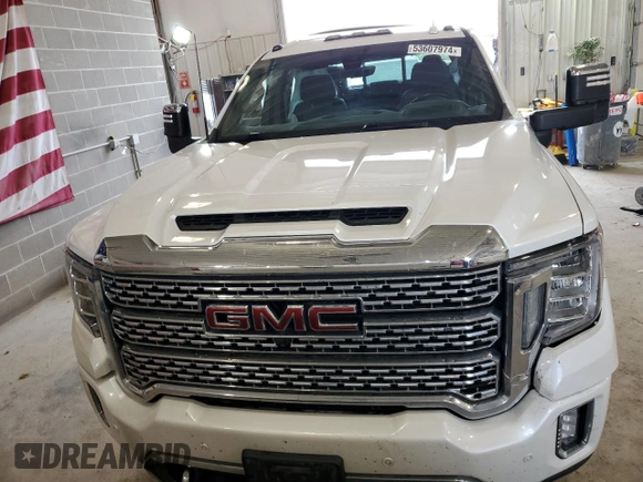 2020 GMC Sierra 3500HD Denali z VIN 1GT49WEY5LF265507, wystawiony jako Copart lot #53607974 z przebiegiem 62 955 mil mil oraz Szkody całkowita. Historia ofert i sprzedaży dostępna na DreamBid. Obrazek 5.