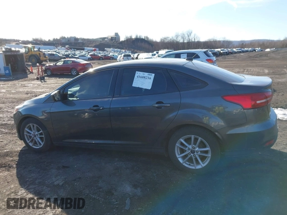 2018 Ford Focus SE z VIN 1FADP3F2XJL295508, wystawiony jako IAAI lot #41608216 z przebiegiem 89 696 mil mil oraz . Historia ofert i sprzedaży dostępna na DreamBid. Obrazek 14.