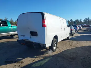 2014 Chevrolet Express Cargo Van with VIN 1GCWGGBA6E1122934, listed as a IAAI auction lot 40999693 with 194,565 mi miles. Bid and sale history available at carsss.com. Image 4.