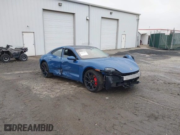 2022 Porsche Taycan GTS z VIN WP0AD2Y17NSA59692, wystawiony jako IAAI lot #41961572 z przebiegiem 12 680 mil mil oraz . Historia ofert i sprzedaży dostępna na DreamBid. Obrazek 1.
