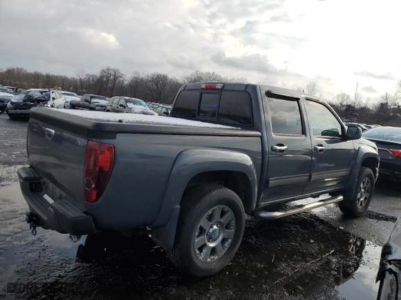 2012 GMC Canyon SLE2 with VIN 1GTH6PFE5C8147076, listed as a Copart auction lot 83698534 with 153,668 mi miles and Clean Title. Bid and sale history available at carsss.com. Image 3.