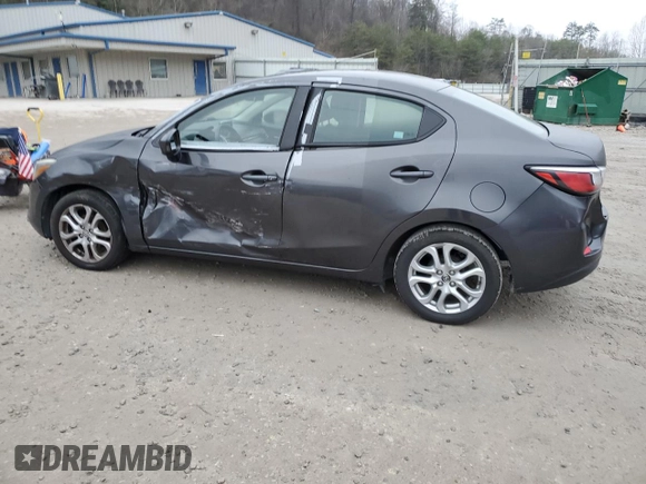 2016 Scion iA with VIN 3MYDLBZV2GY108611, listed as a Copart auction lot 83947564 with 82,594 mi miles and Salvage Title. Bid and sale history available at carsss.com. Image 2.