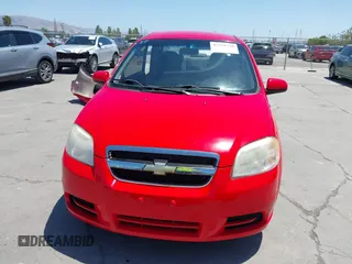2011 Chevrolet Aveo 1LT z VIN KL1TD5DE0BB151956, wystawiony jako IAAI lot #42328720 z przebiegiem 115 765 mil mil oraz . Historia ofert i sprzedaży dostępna na DreamBid. Obrazek 13.