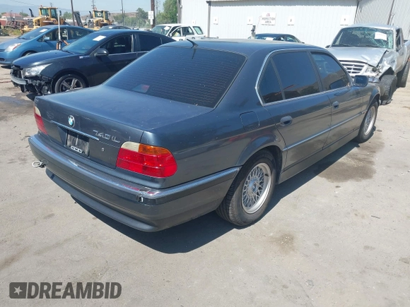 2000 BMW 7 Series 740iL with VIN WBAGH8348YDP14383, listed as a IAAI auction lot 42623041 with 176,801 mi miles and . Bid and sale history available at DreamBid. Image 4.