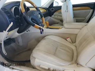 2003 Lexus SC 430 z VIN JTHFN48YX30045320, wystawiony jako Copart lot #57385515 z przebiegiem 104 178 mil mil oraz Szkoda całkowita • Salvage title. Historia ofert i sprzedaży dostępna na DreamBid. Obrazek 7.