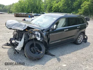 2014 Jeep Grand Cherokee Limited with VIN 1C4RJFBG6EC571483, listed as a Copart auction lot 60560085 with Not provided miles and Salvage title. Bid and sale history available at DreamBid. Image 1.