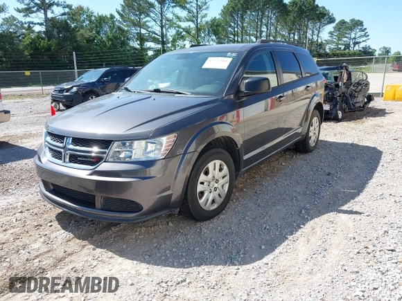 2015 Dodge Journey American Value z VIN 3C4PDCAB2FT565933, wystawiony jako IAAI lot #42327885 z przebiegiem 177 544 mil mil oraz . Historia ofert i sprzedaży dostępna na DreamBid. Obrazek 2.