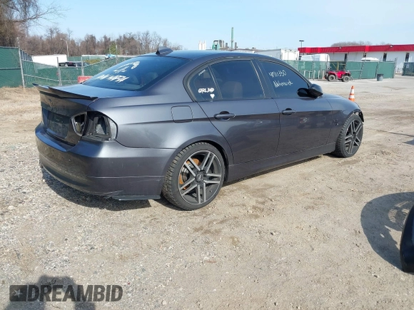 2007 BMW 3 Series 328xi with VIN WBAVC93587K031632, listed as a IAAI auction lot 41711350 with 184,703 mi miles. Bid and sale history available at carsss.com. Image 4.