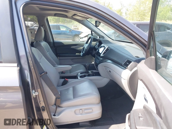 2016 Honda Pilot EX-L with VIN 5FNYF6H54GB083139, listed as a IAAI auction lot 42150923 with 213,009 mi miles and . Bid and sale history available at DreamBid. Image 5.