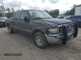 2004 Ford F-250 XL with VIN 1FTNW20P44EC09571, listed as a Copart auction lot 52986575 with Not provided miles and Salvage title. Bid and sale history available at DreamBid. Image 4.