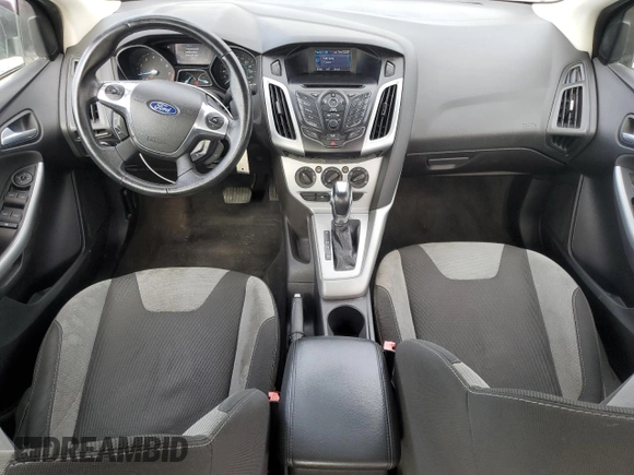 2012 Ford Focus SE with VIN 1FAHP3F27CL335046, listed as a Copart auction lot 55235175 with 128,119 mi miles and Salvage title. Bid and sale history available at DreamBid. Image 8.
