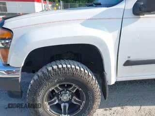 2007 Chevrolet Colorado 1LT z VIN 1GCDT13E978249656, wystawiony jako IAAI lot #42445862 z przebiegiem 115 298 mil mil oraz . Historia ofert i sprzedaży dostępna na DreamBid. Obrazek 6.