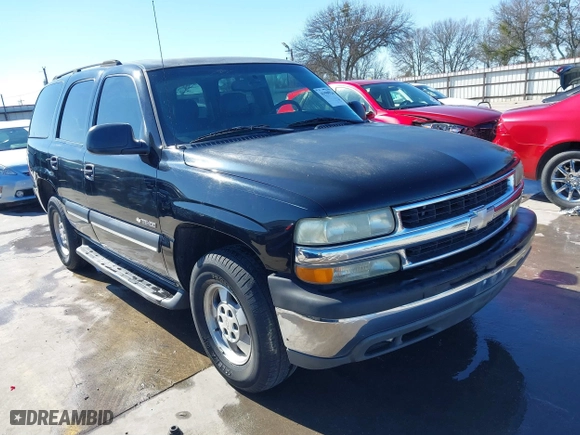 2003 Chevrolet Tahoe LS with VIN 1GNEC13V63R245581, listed as a IAAI auction lot 41599241 with 234,028 mi miles. Bid and sale history available at carsss.com. Image 1.