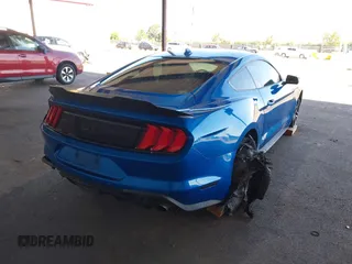 2021 Ford Mustang GT with VIN 1FA6P8CFXM5101257, listed as a IAAI auction lot 42207879 with 37,036 mi miles and . Bid and sale history available at DreamBid. Image 4.