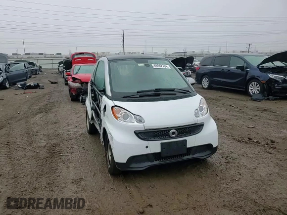 2015 Smart fortwo Passion z VIN WMEEJ3BA3FK791701, wystawiony jako Copart lot #86552704 z przebiegiem 27 313 mil mil oraz Szkoda całkowita • Salvage title. Historia ofert i sprzedaży dostępna na DreamBid. Obrazek 11.