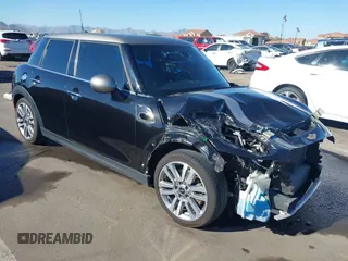 2017 MINI Hardtop 4 Door Cooper S z VIN WMWXU3C56H2D33072, wystawiony jako IAAI lot #41847726 z przebiegiem 81 783 mil mil oraz . Historia ofert i sprzedaży dostępna na DreamBid. Obrazek 1.