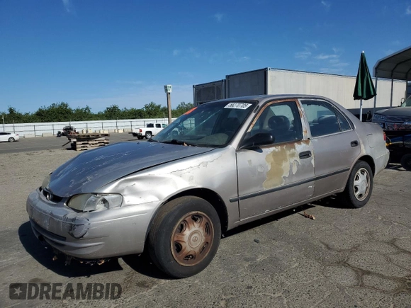 1998 Toyota Corolla VE with VIN 1NXBR12E3WZ093073, listed as a Copart auction lot 58270705 with 303,875 mi miles and Salvage title. Bid and sale history available at DreamBid. Image 1.