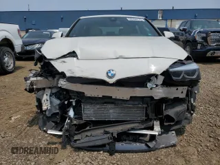 2021 BMW 2 Series 228i xDrive with VIN WBA73AK09M7G44389, listed as a Copart auction lot 59508235 with 43,725 mi miles and Non repairable. Bid and sale history available at DreamBid. Image 5.
