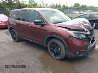 2019 Honda Passport Sport with VIN 5FNYF8H21KB010014, listed as a IAAI auction lot 42334660 with 76,548 mi miles and . Bid and sale history available at DreamBid. Image 1.