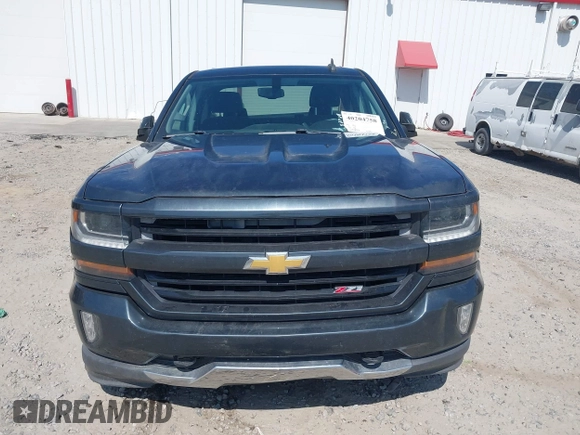 2017 Chevrolet Silverado 1500 LT with VIN 1GCVKREC9HZ180710, listed as a IAAI auction lot 40204758 with 255,247 mi miles and . Bid and sale history available at DreamBid. Image 12.
