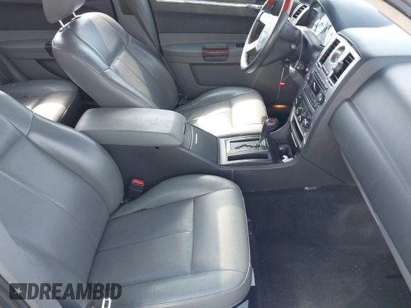 2005 Chrysler 300 with VIN 2C3AA53G35H157083, listed as a IAAI auction lot 41945392 with 192,215 mi miles. Bid and sale history available at carsss.com. Image 5.