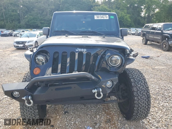 2011 Jeep Wrangler Unlimited Rubicon с VIN 1J4BA6H17BL634200, выставлен на аукционе Copart как лот 56154275 с пробегом 146 500 миль миль и Списание • Salvage title. История ставок и продаж доступна на DreamBid. Изображение 5.
