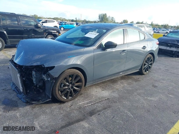 2023 Mazda Mazda3 Sedan 2.5 S Carbon Edition with VIN 3MZBPBCM5PM373232, listed as a IAAI auction lot 41162594 with 19,339 mi miles. Bid and sale history available at carsss.com. Image 2.