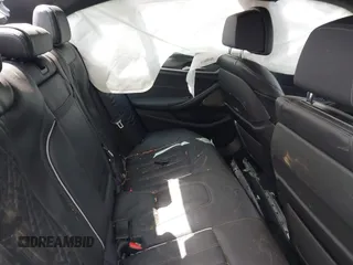 2022 BMW 5 Series M550i xDrive with VIN WBA13BK08NCJ54124, listed as a IAAI auction lot 41977413 with Not provided miles and . Bid and sale history available at DreamBid. Image 8.