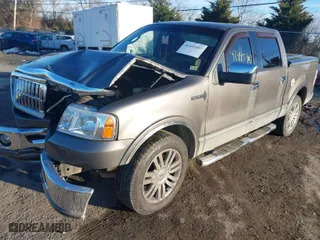2007 Lincoln Mark LT with VIN 5LTPW16557FJ03103, listed as a IAAI auction lot 41445407 with 118,083 mi miles. Bid and sale history available at carsss.com. Image 2.