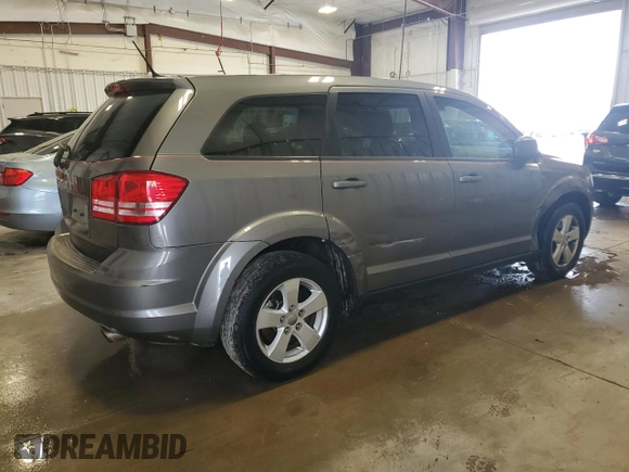 2013 Dodge Journey American Value with VIN 3C4PDCAB8DT509251, listed as a Copart auction lot 53996125 with 112,041 mi miles and Non Repairable. Bid and sale history available at DreamBid. Image 3.